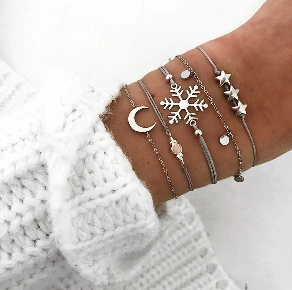 Pack Of 5 personality bangle bracelet with stars/crescent and snow design in mixed link chains
Pack Of 5 personality bangle bracelet with stars/crescent and snow design in mixed link chains