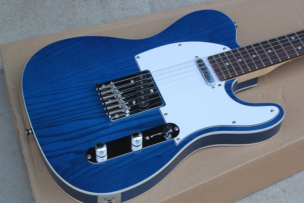 Factory custom transparent blue body electric guitar with TL pickups,chrome hardware,white pickguard,can be customized
Factory custom transparent blue body electric guitar with TL pickups,chrome hardware,white pickguard,can be customized