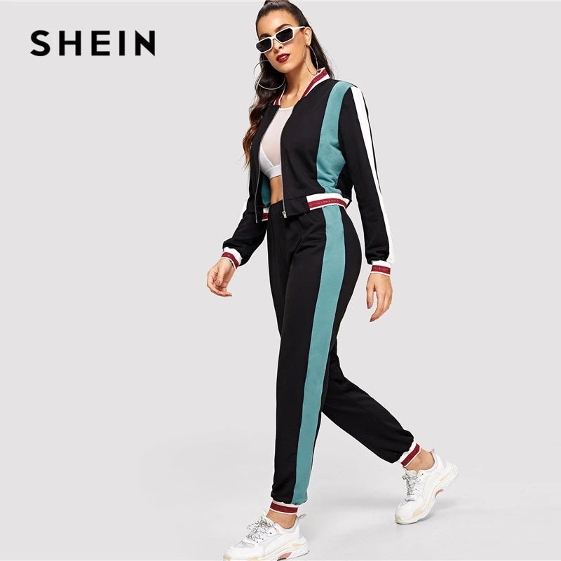 SHEIN Black Color Block O-Ring Zip Up Stand Collar Sweatshirt and Sweatpants Set Women Autumn Elegant Workwear Twopiece
SHEIN Black Color Block O-Ring Zip Up Stand Collar Sweatshirt and Sweatpants Set Women Autumn Elegant Workwear Twopiece