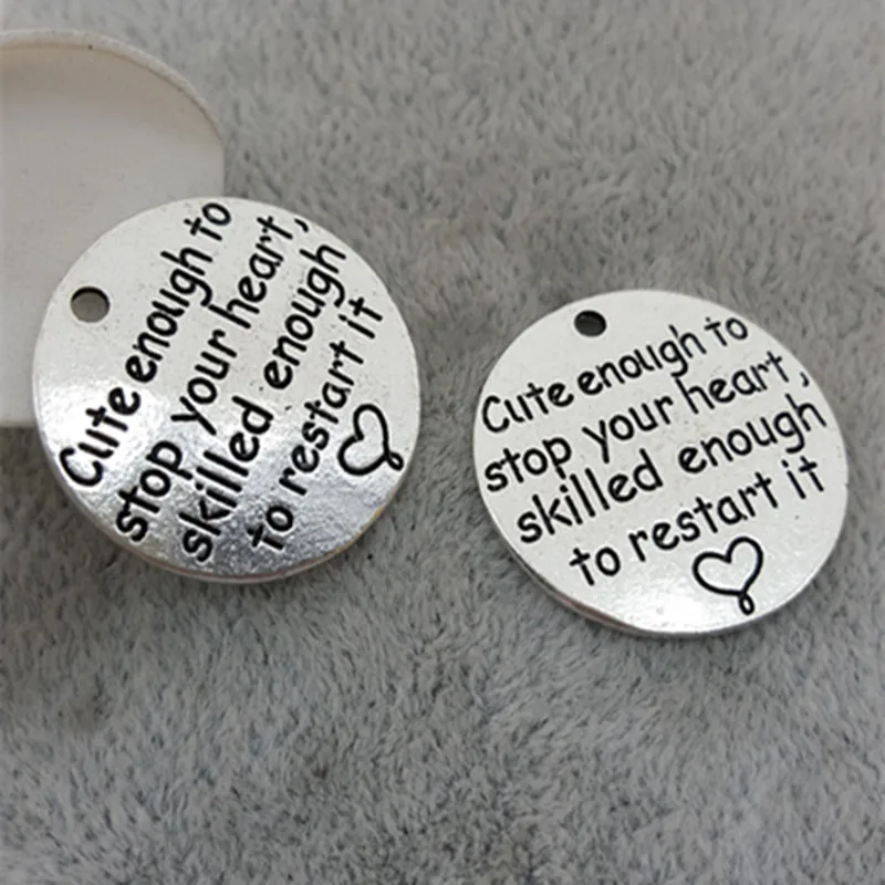 50pcs 23MM "Cute enough to stop your heart, skilled enough to restart it" word charms, round lettering message Pendant jewelry
50pcs 23MM "Cute enough to stop your heart, skilled enough to restart it" word charms, round lettering message Pendant jewelry