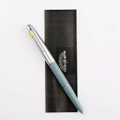 All-Steel old factory genuine hero 100 steel 14K nib Classic antique teacher collection calligraphy gift box pen pimio
All-Steel old factory genuine hero 100 steel 14K nib Classic antique teacher collection calligraphy gift box pen pimio