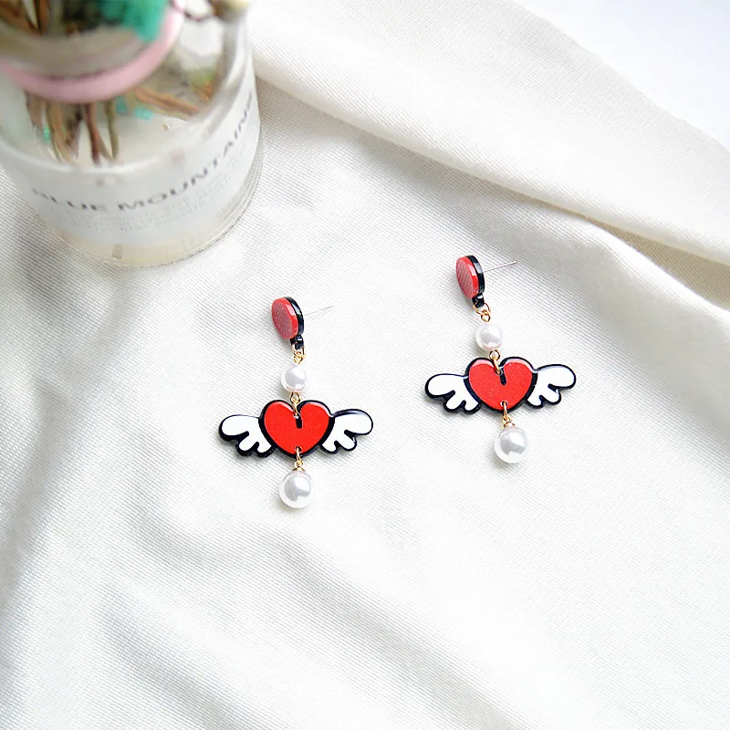 2019 Fashion cartoon Korean funny acrylic asymmetric lipstick love heart letters long pearl earrings women jewelry pendants gift
2019 Fashion cartoon Korean funny acrylic asymmetric lipstick love heart letters long pearl earrings women jewelry pendants gift