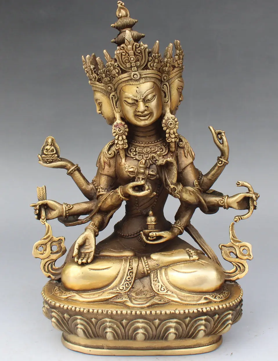 9" Tibet Buddhism Bronze 3 Head 8 Arms Namgyalma & Ushnishavijaya Buddha Statue 22cm
9" Tibet Buddhism Bronze 3 Head 8 Arms Namgyalma & Ushnishavijaya Buddha Statue 22cm