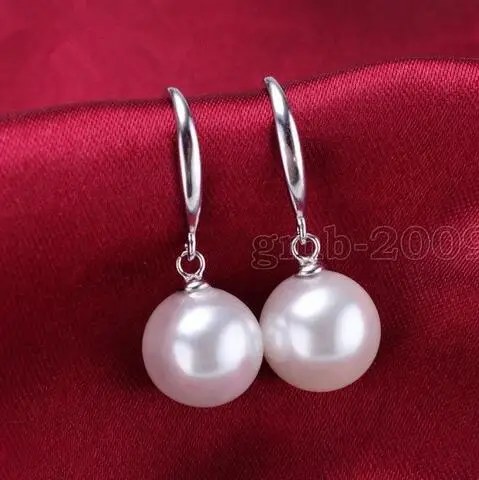 Genuine 10 mm round white SOUTH SEA In the form of seashell pearl shells Silver earrings
Genuine 10 mm round white SOUTH SEA In the form of seashell pearl shells Silver earrings
