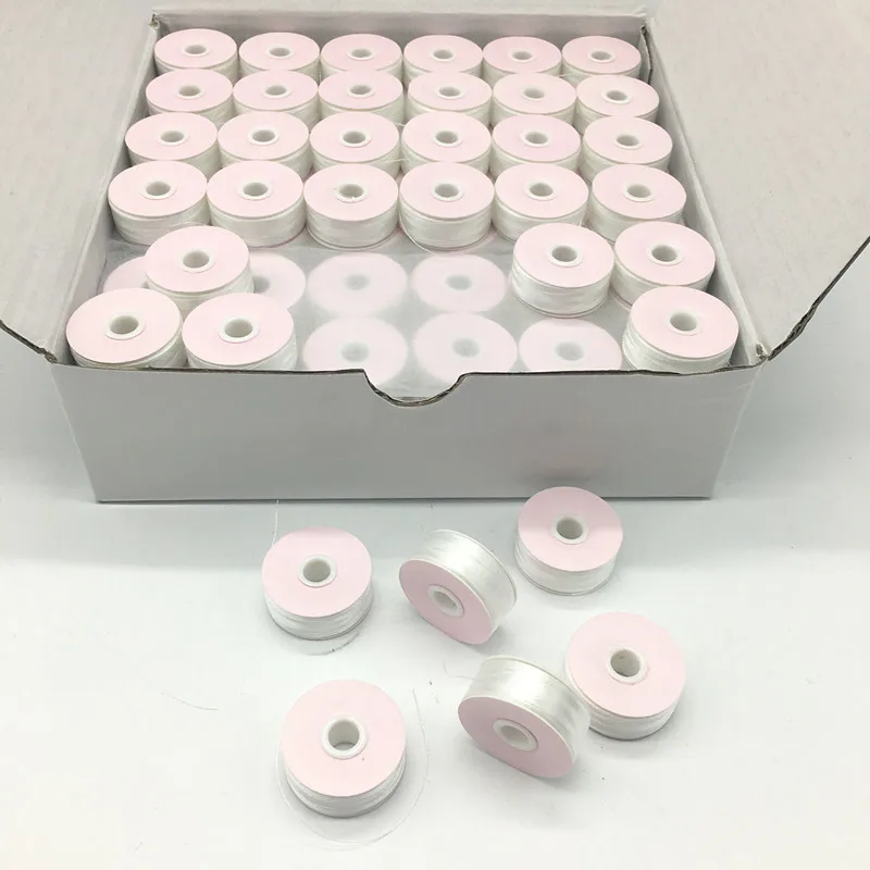 Good Quality 100% polyester prewound bobbins Size M White/ Black 75D/2 Paper side 144pcs/box Pre-wound bobbin for embroidery
Good Quality 100% polyester prewound bobbins Size M White/ Black 75D/2 Paper side 144pcs/box Pre-wound bobbin for embroidery