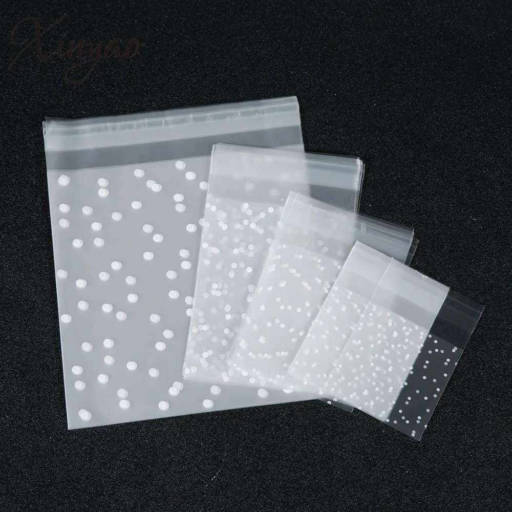 XINYAO 100pcs/lot White Dots Plastic Christmas Gift Bag OPP Birthday Party Wedding Cookie Candy Bag
XINYAO 100pcs/lot White Dots Plastic Christmas Gift Bag OPP Birthday Party Wedding Cookie Candy Bag