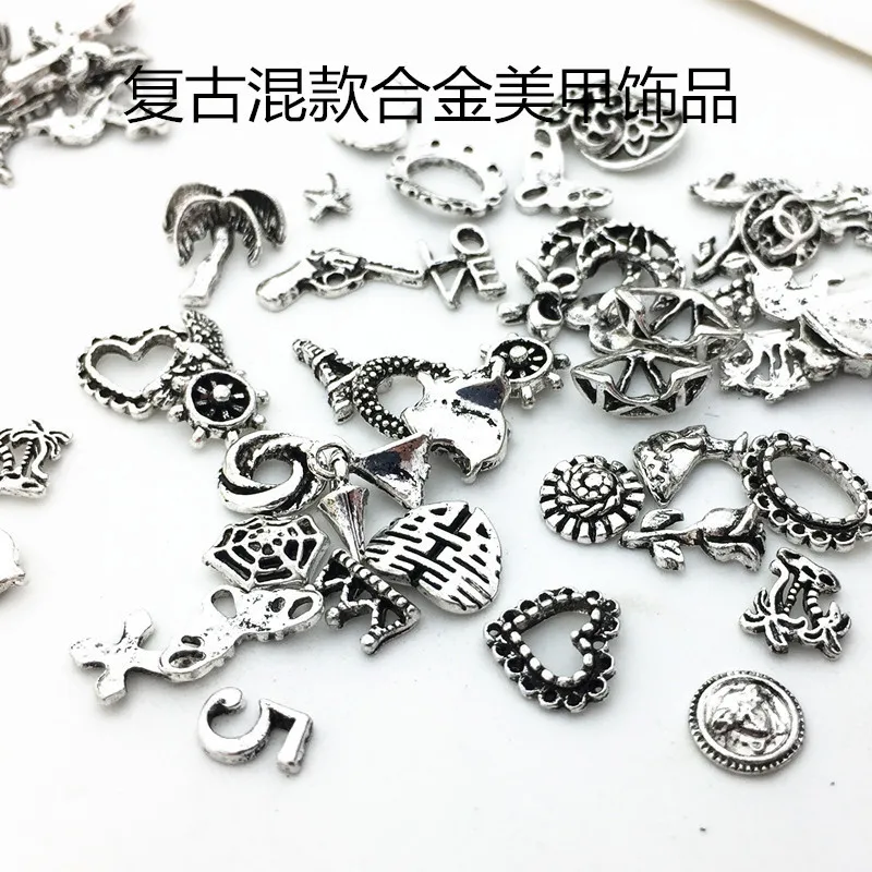 100pcs Japanese retro metal nail ornaments peach heart rose hollow oval ring punk alloy three-dimensional nail ornaments mixed
100pcs Japanese retro metal nail ornaments peach heart rose hollow oval ring punk alloy three-dimensional nail ornaments mixed