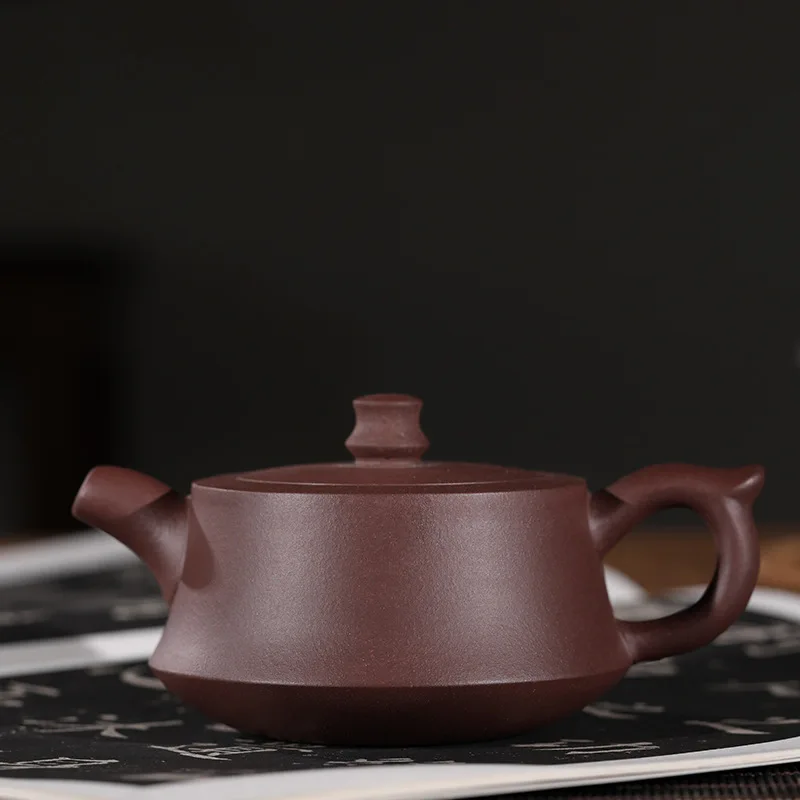 Yixing recommended handmade undressed ore purple clay column development pot teapot kung fu tea set gift suit the teapot
Yixing recommended handmade undressed ore purple clay column development pot teapot kung fu tea set gift suit the teapot
