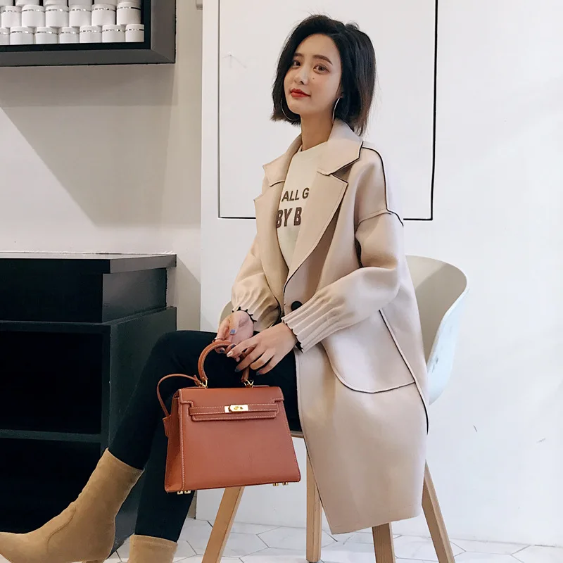 Woollen Coat women's Medium Long Style Wind Coat 2018 New Fashion Autumn and Winter Turn-down Collar Coat
Woollen Coat women's Medium Long Style Wind Coat 2018 New Fashion Autumn and Winter Turn-down Collar Coat