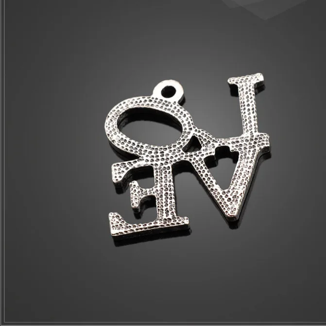 50 PCS/Lot 22.8mm*23.6mm metal diy handmade tibetan silver LOVE alphabet pendants charms for jewlery
50 PCS/Lot 22.8mm*23.6mm metal diy handmade tibetan silver LOVE alphabet pendants charms for jewlery