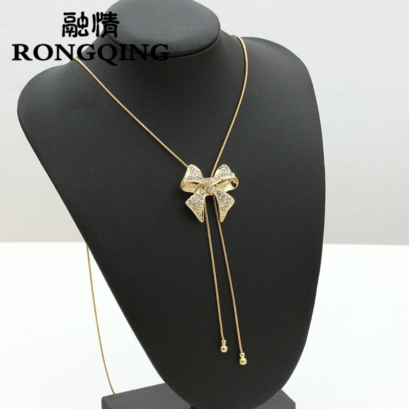 RONGQING 12Pcs/lot Hollow Rhinestone Bowknot Pendant Sweater Chain Necklace Long Tassel Necklace Collares Largos
RONGQING 12Pcs/lot Hollow Rhinestone Bowknot Pendant Sweater Chain Necklace Long Tassel Necklace Collares Largos