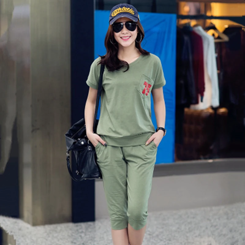 New Women's Summer Solid Color Loose Casual Sports Suit Ms Temperament V-neck Digit Short-slee Top & Cropped Pants Sports Suit
New Women's Summer Solid Color Loose Casual Sports Suit Ms Temperament V-neck Digit Short-slee Top & Cropped Pants Sports Suit
