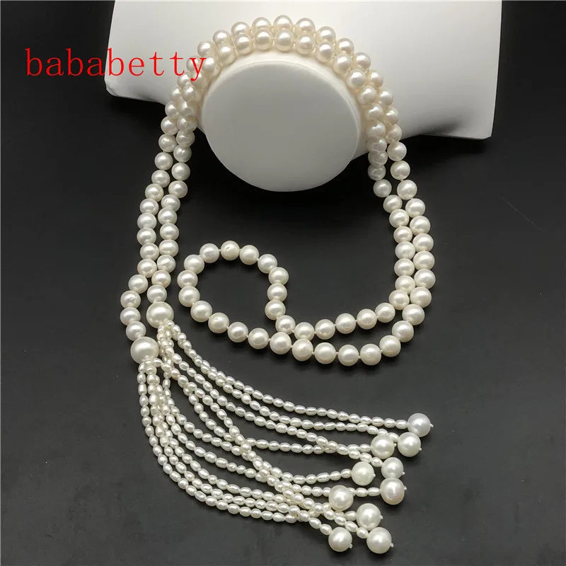 New natural freshwater pearl 9-10MM necklace Fringed pearl is 3-4MM rice shape Pearl sweater chain is 50 inches long
New natural freshwater pearl 9-10MM necklace Fringed pearl is 3-4MM rice shape Pearl sweater chain is 50 inches long