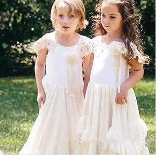 Boho New Flower Girls Dresses Lace Applique Jewel Neck Ruffled Little Princess Communion Dress Birthday Party Gown
Boho New Flower Girls Dresses Lace Applique Jewel Neck Ruffled Little Princess Communion Dress Birthday Party Gown