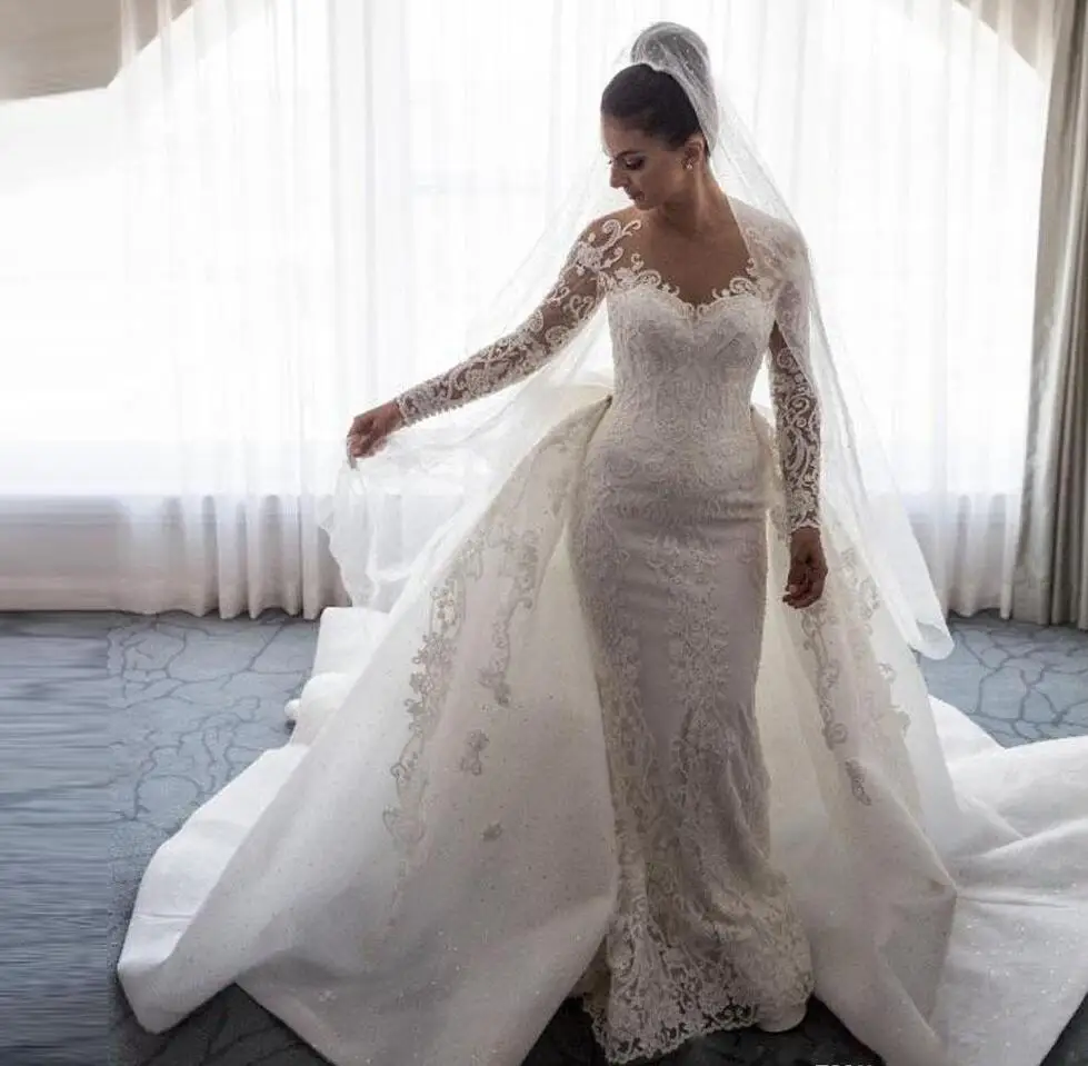Lace Appliqued Mermaid Wedding Dresses With Bow Sheer Long Sleeves Overskirts Bridal Gowns Button Back Wedding Dress Plus Size
Lace Appliqued Mermaid Wedding Dresses With Bow Sheer Long Sleeves Overskirts Bridal Gowns Button Back Wedding Dress Plus Size