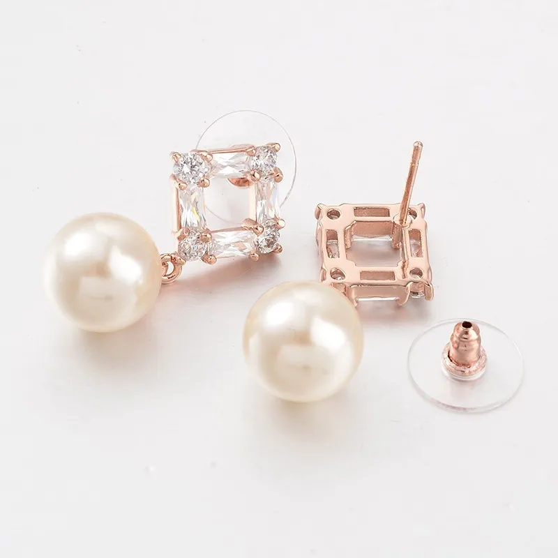 1 pair Fashionable Brass Micro Pave Cubic Zirconia Rhombus Stud Earrings with Glass Pearl and Brass Plastic Ear Nuts Rose Gold
1 pair Fashionable Brass Micro Pave Cubic Zirconia Rhombus Stud Earrings with Glass Pearl and Brass Plastic Ear Nuts Rose Gold