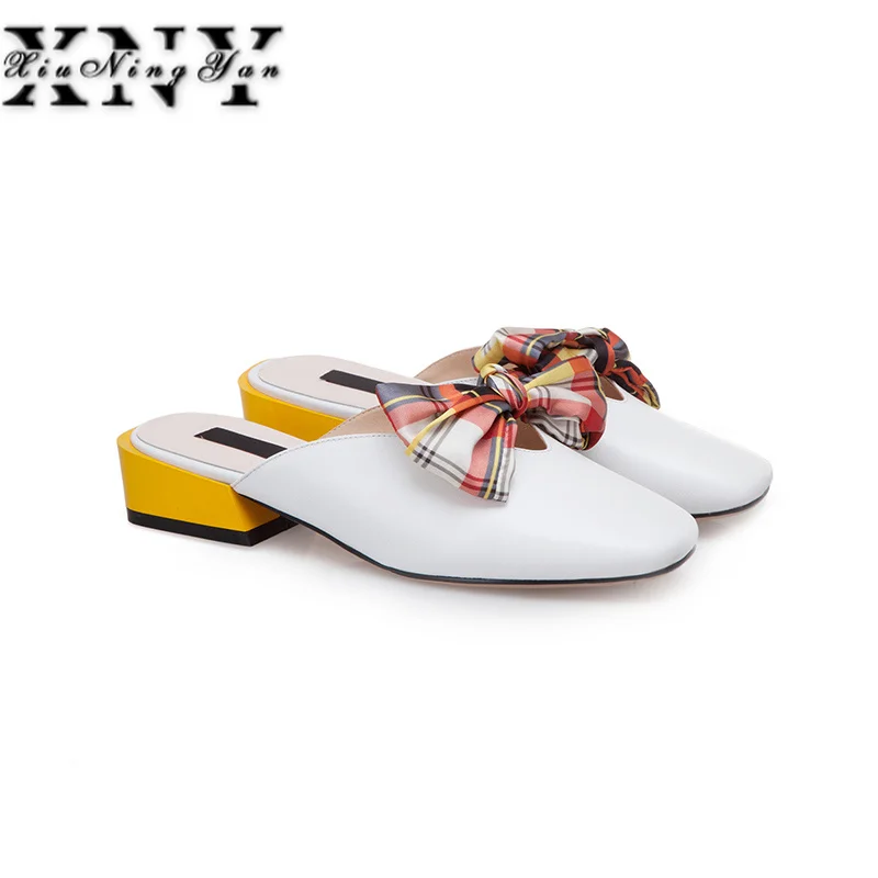 XIUNINGYAN Brand 2019 Genuine Leather Summer Women White Flat Bow Tie Flat Shoes Half Slippers Female Mules Loafer Shoes Slides
XIUNINGYAN Brand 2019 Genuine Leather Summer Women White Flat Bow Tie Flat Shoes Half Slippers Female Mules Loafer Shoes Slides
