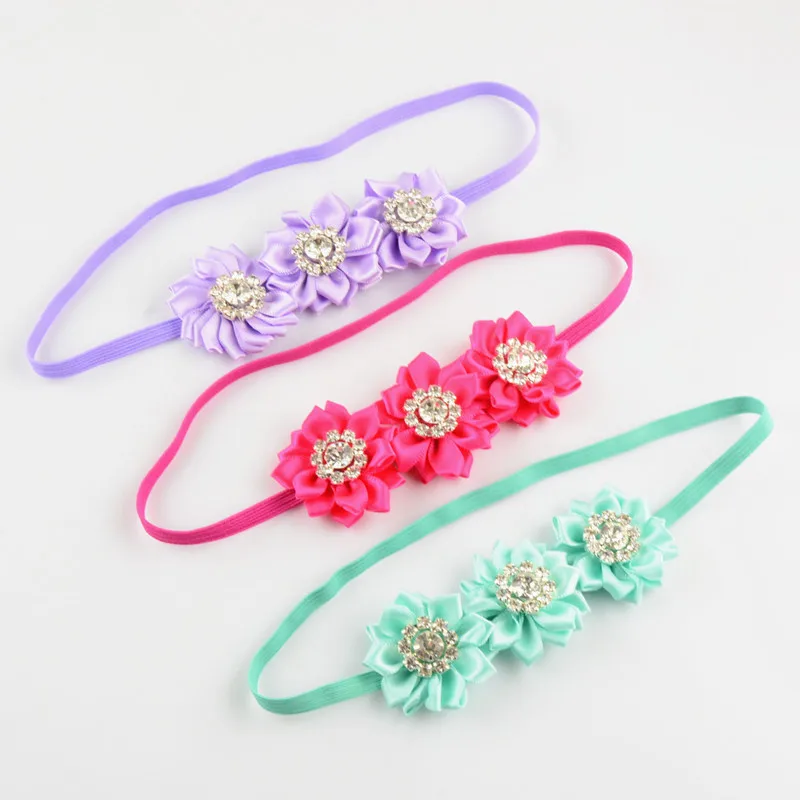 10 pcs/lot , Three Mini Satin Flowers with Rhinestone Centers on a Skinny Elastic Headband
10 pcs/lot , Three Mini Satin Flowers with Rhinestone Centers on a Skinny Elastic Headband