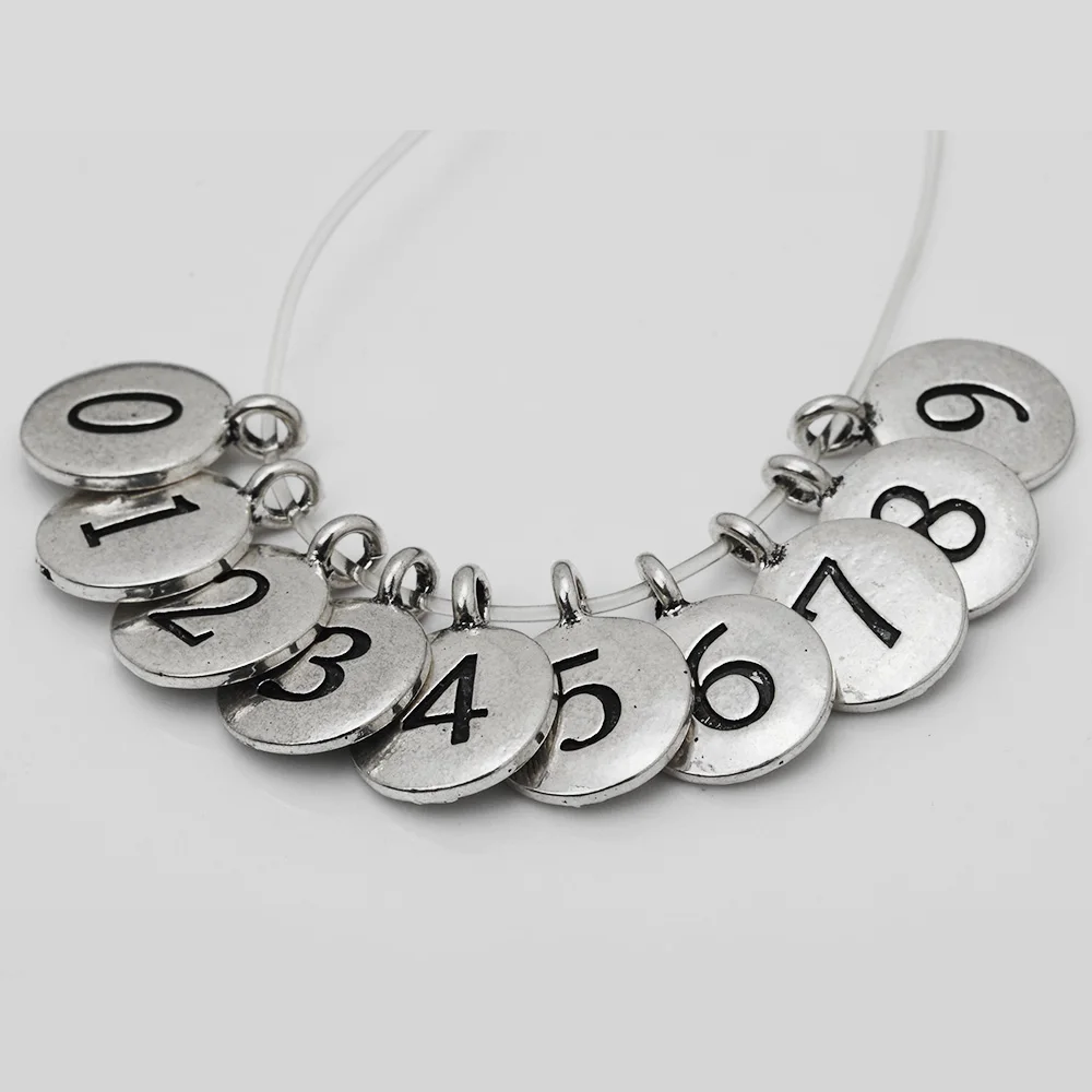 12 MM Digital 0-9 DIY Matel Number Charms Jewelry, Silver tone Round Alloy Number Symbol Mini Pendants, 20 pcs/design 
12 MM Digital 0-9 DIY Matel Number Charms Jewelry, Silver tone Round Alloy Number Symbol Mini Pendants, 20 pcs/design