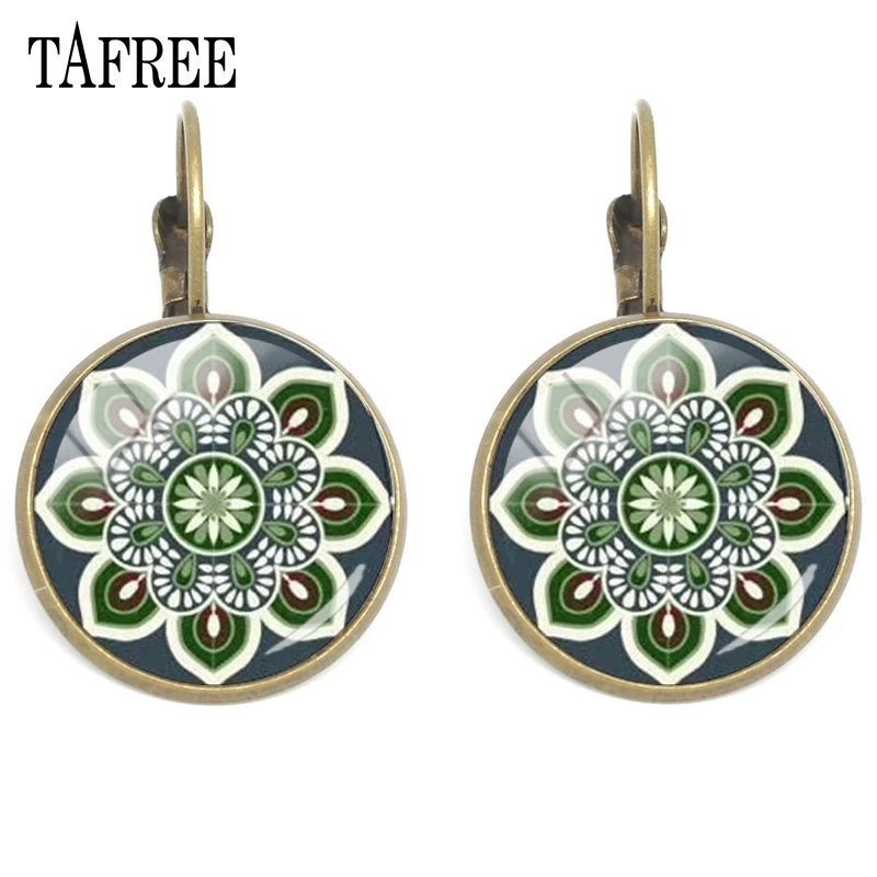 TAFREE Vintage Mandala OM Hinduism Glass Jewelry Datura Flower Round Clips Earrings For Women birthday Best Gift HN119
TAFREE Vintage Mandala OM Hinduism Glass Jewelry Datura Flower Round Clips Earrings For Women birthday Best Gift HN119