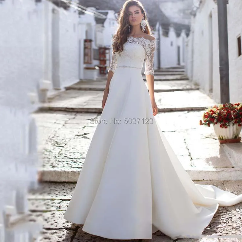 2020 Off the Shoulder Wedding Dresses Lace Appliques Bridal Gown Plus Size Half Sleeves Court Train Illusion Vestidos De Noiva
2020 Off the Shoulder Wedding Dresses Lace Appliques Bridal Gown Plus Size Half Sleeves Court Train Illusion Vestidos De Noiva