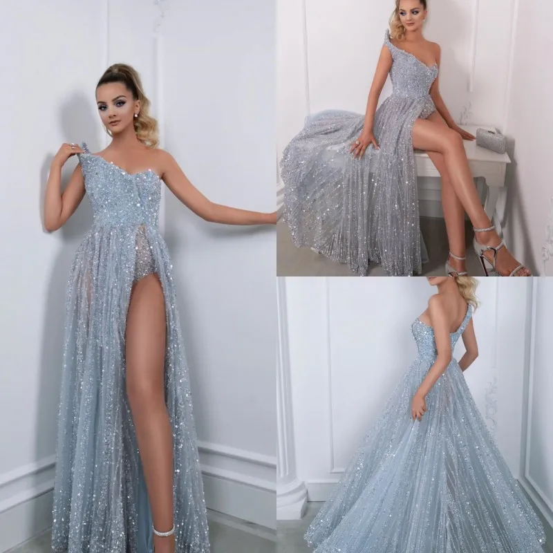 One Shoulder Sexy Evening Dresses Floor Length Sparkly Sequined Thigh High Slit Crystals Prom Party Gowns Custom Made
One Shoulder Sexy Evening Dresses Floor Length Sparkly Sequined Thigh High Slit Crystals Prom Party Gowns Custom Made