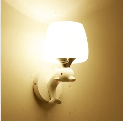 Modern creative LED wall lamp glass sweet contracted dolphins children bedroom the head of a bed room sitting room corridor wall
Modern creative LED wall lamp glass sweet contracted dolphins children bedroom the head of a bed room sitting room corridor wall