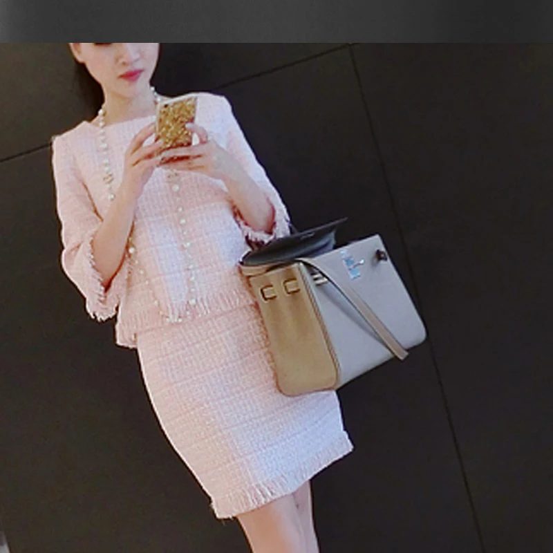 Pink plaid tweed jacket + skirt suit fringed spring / autumn ladies skirt suit women nap 5 points sleeve 2 piece set
Pink plaid tweed jacket + skirt suit fringed spring / autumn ladies skirt suit women nap 5 points sleeve 2 piece set