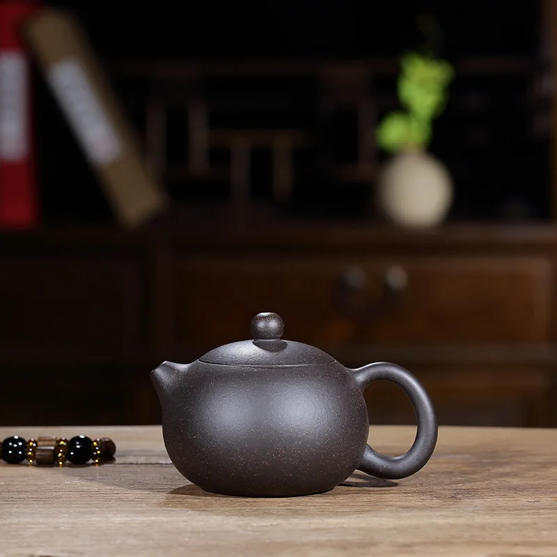 clay pot genuine hand-made raw ore black cinnamon mud black diamond cap ball hole Xishi pot Kungfu Teapot Tea Set
clay pot genuine hand-made raw ore black cinnamon mud black diamond cap ball hole Xishi pot Kungfu Teapot Tea Set