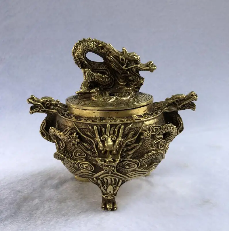Pure copper two dragon play beads Kowloon incense burner ornaments aromatherapy furnace copper antique craft collection
Pure copper two dragon play beads Kowloon incense burner ornaments aromatherapy furnace copper antique craft collection