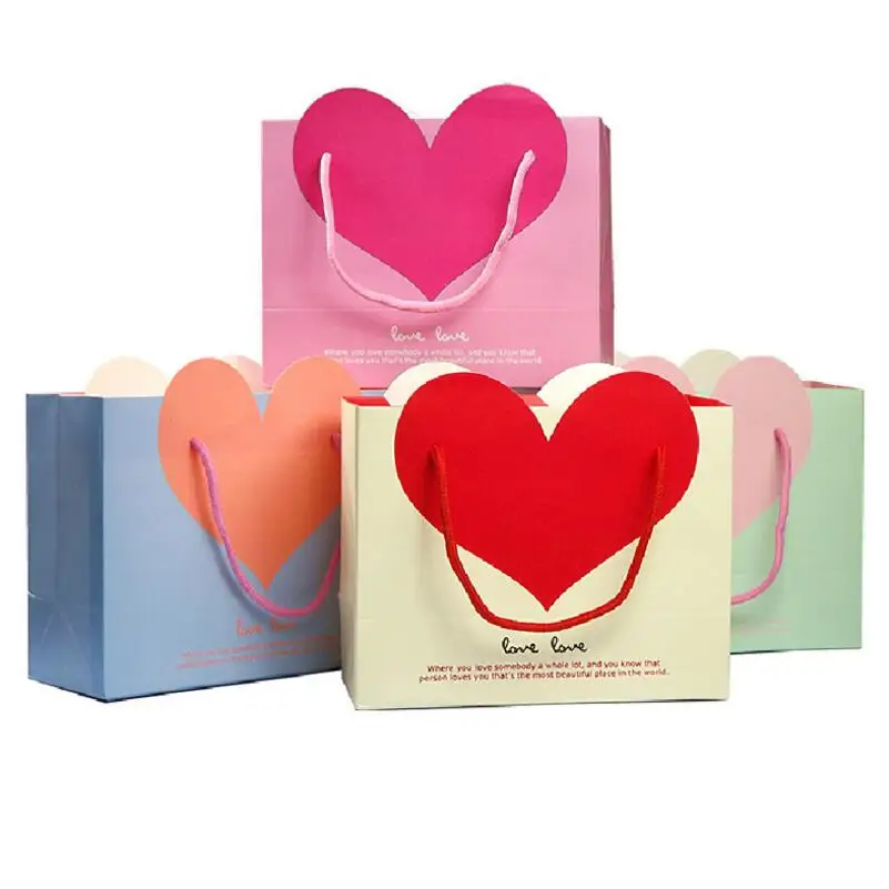 10pcs/lot Heart Shaped Pattern Gift Paper Bag with Handle Valentine's Day Wedding Birthday Party Gift Package Bag
10pcs/lot Heart Shaped Pattern Gift Paper Bag with Handle Valentine's Day Wedding Birthday Party Gift Package Bag