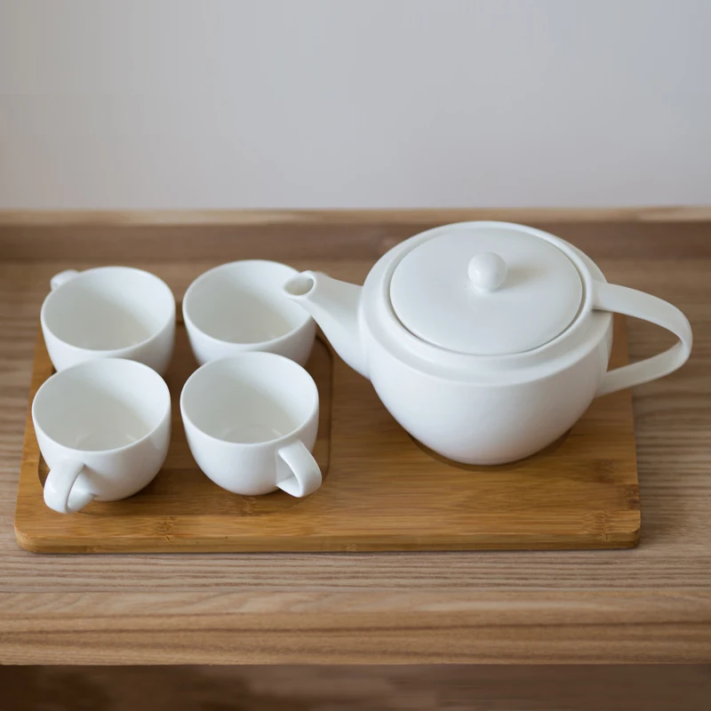 Hot Sale White Coffee Tea Set Simple Design Ceramic with Four Cups One Pot and Wood Tray Home Decor Accessories for Living Room
Hot Sale White Coffee Tea Set Simple Design Ceramic with Four Cups One Pot and Wood Tray Home Decor Accessories for Living Room