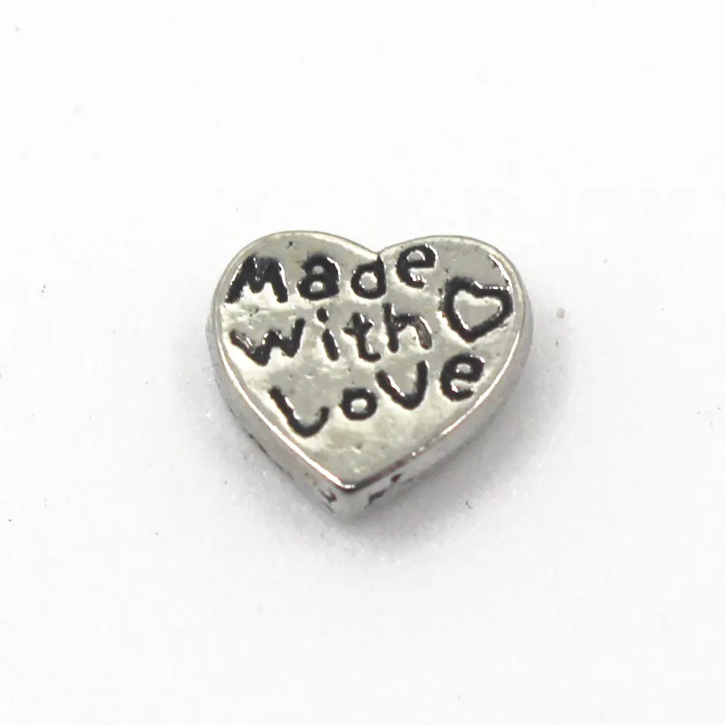 50pcs/lot silver Made With Love heart floating charms living glass memory floating lockets diy jewelry pendant
50pcs/lot silver Made With Love heart floating charms living glass memory floating lockets diy jewelry pendant