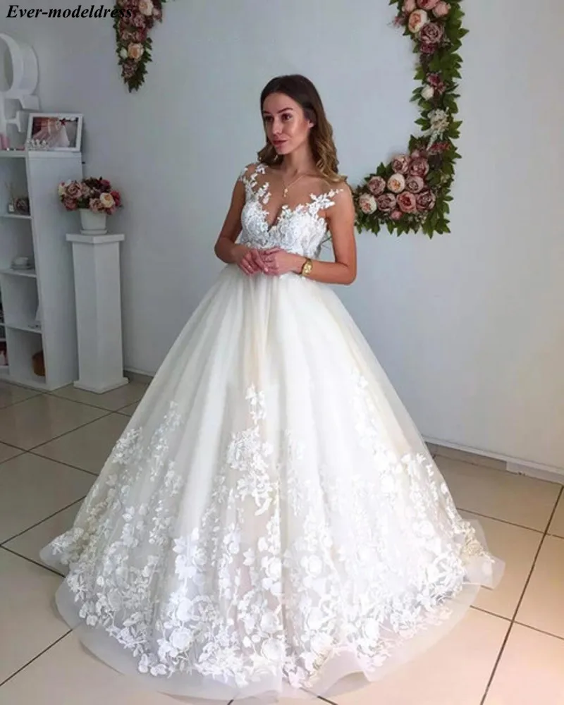 Elegant Lace Wedding Dresses 2019 Appliques Sheer O-Neck Cap Sleeves Zipper Back Sweep Train Bride Dresses Robe De Mariage
Elegant Lace Wedding Dresses 2019 Appliques Sheer O-Neck Cap Sleeves Zipper Back Sweep Train Bride Dresses Robe De Mariage