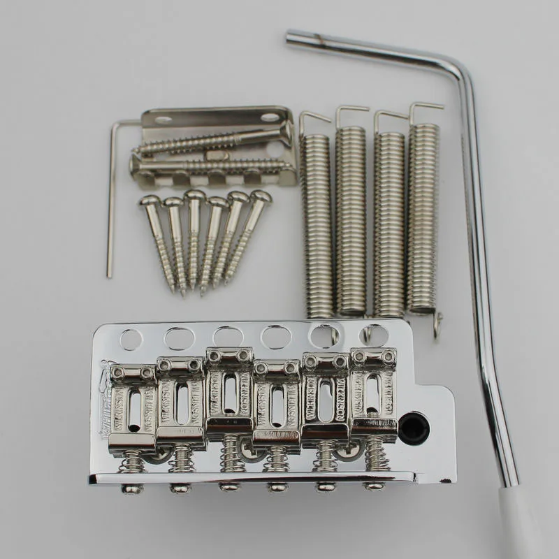 Wilkinson ST Electric Guitar Tremolo System Bridge + Bent Steel Saddles+Brass Block WV6 Chrome
Wilkinson ST Electric Guitar Tremolo System Bridge + Bent Steel Saddles+Brass Block WV6 Chrome