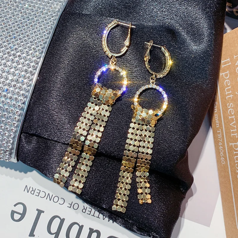Korean personality ear ring metal sequins temperament fashion exaggerated earrings
Korean personality ear ring metal sequins temperament fashion exaggerated earrings