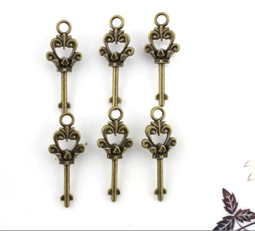 

100pcs filigree zinc alloy key antique bronze lead and nickle free pendant, charm, drops for diy 36X14mm