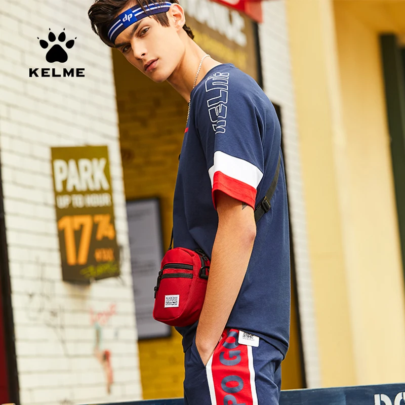 Мужская летняя футболка с коротким рукавом KELME, свободная Модная Повседневная рубашка с круглым вырезом, дышащая 39921005
Мужская летняя футболка с коротким рукавом KELME, свободная Модная Повседневная рубашка с круглым вырезом, дышащая 39921005