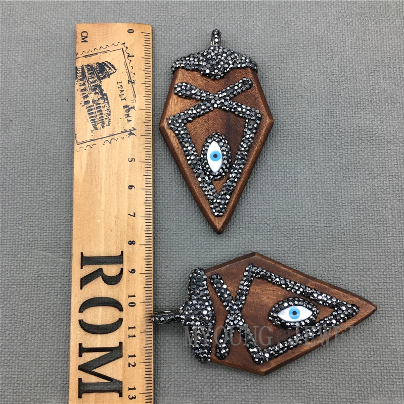 Large Arrowhead Shape Wood Charm Pendant Paved Rhinestones, Turkish style Evil eye Charms Pendant MY1325
Large Arrowhead Shape Wood Charm Pendant Paved Rhinestones, Turkish style Evil eye Charms Pendant MY1325