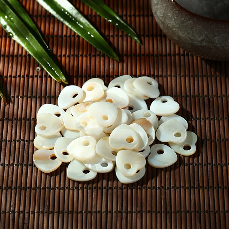50Pcs/lot wholesale 12.5mm natural shell beads heart beads for DIY handmade jewelry making accessories earrings free
50Pcs/lot wholesale 12.5mm natural shell beads heart beads for DIY handmade jewelry making accessories earrings free