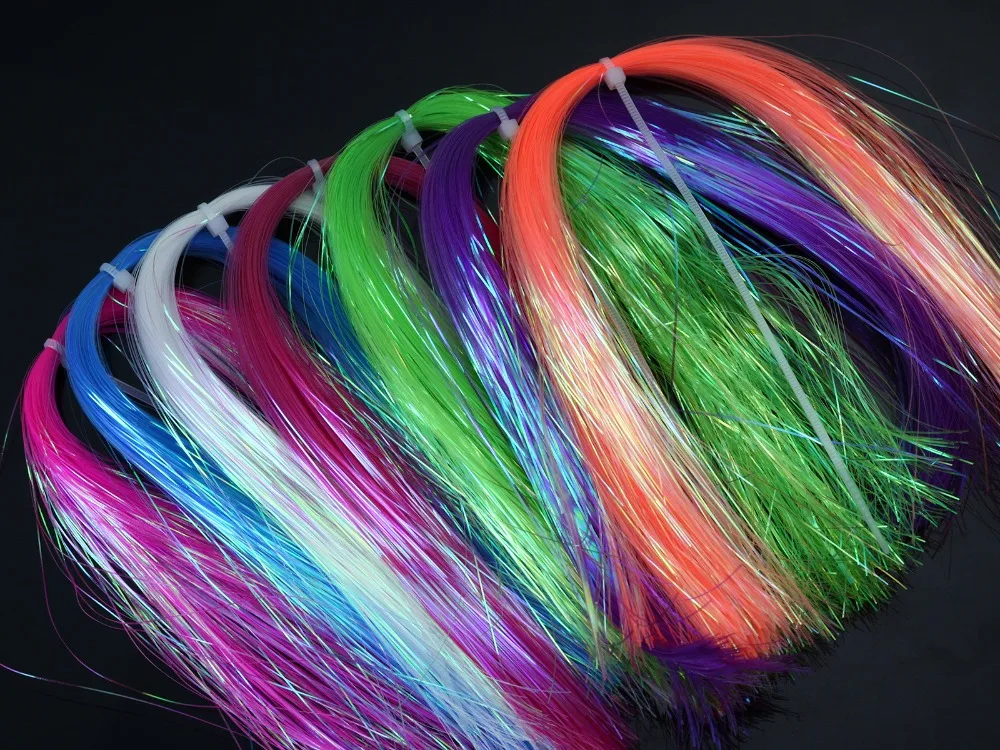 Dyed-Pearl Flashabou Hedron Fly Tying Materials;Available in 7 Colors ,1/69" Wide By 12" Long.
Dyed-Pearl Flashabou Hedron Fly Tying Materials;Available in 7 Colors ,1/69" Wide By 12" Long.