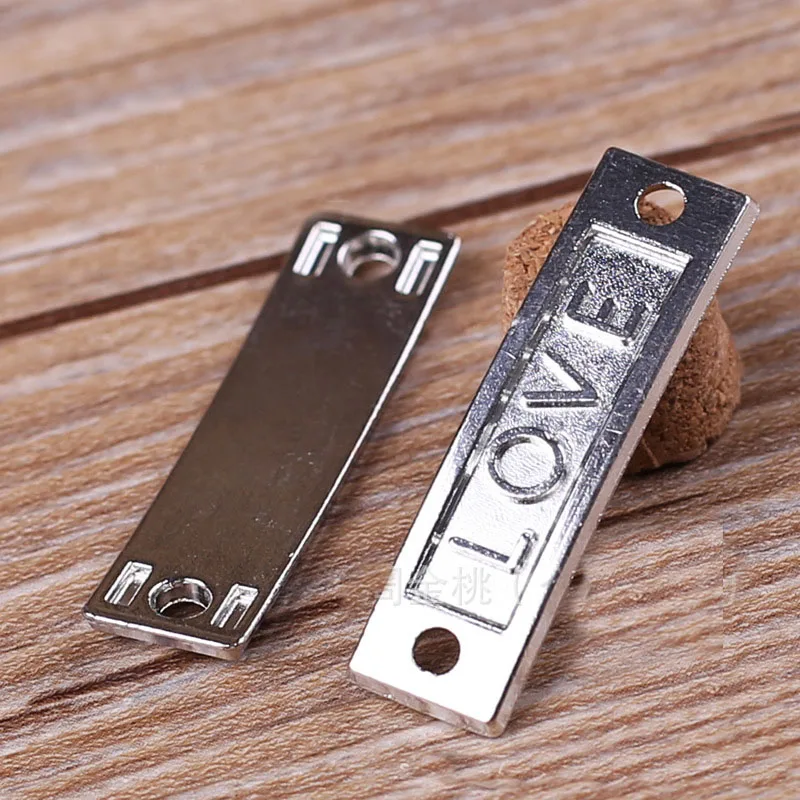 High quality 50 PCS/Lot 36mm*10mm jewelry handmade silver plated bright silver letter love tag connector for jewelry
High quality 50 PCS/Lot 36mm*10mm jewelry handmade silver plated bright silver letter love tag connector for jewelry