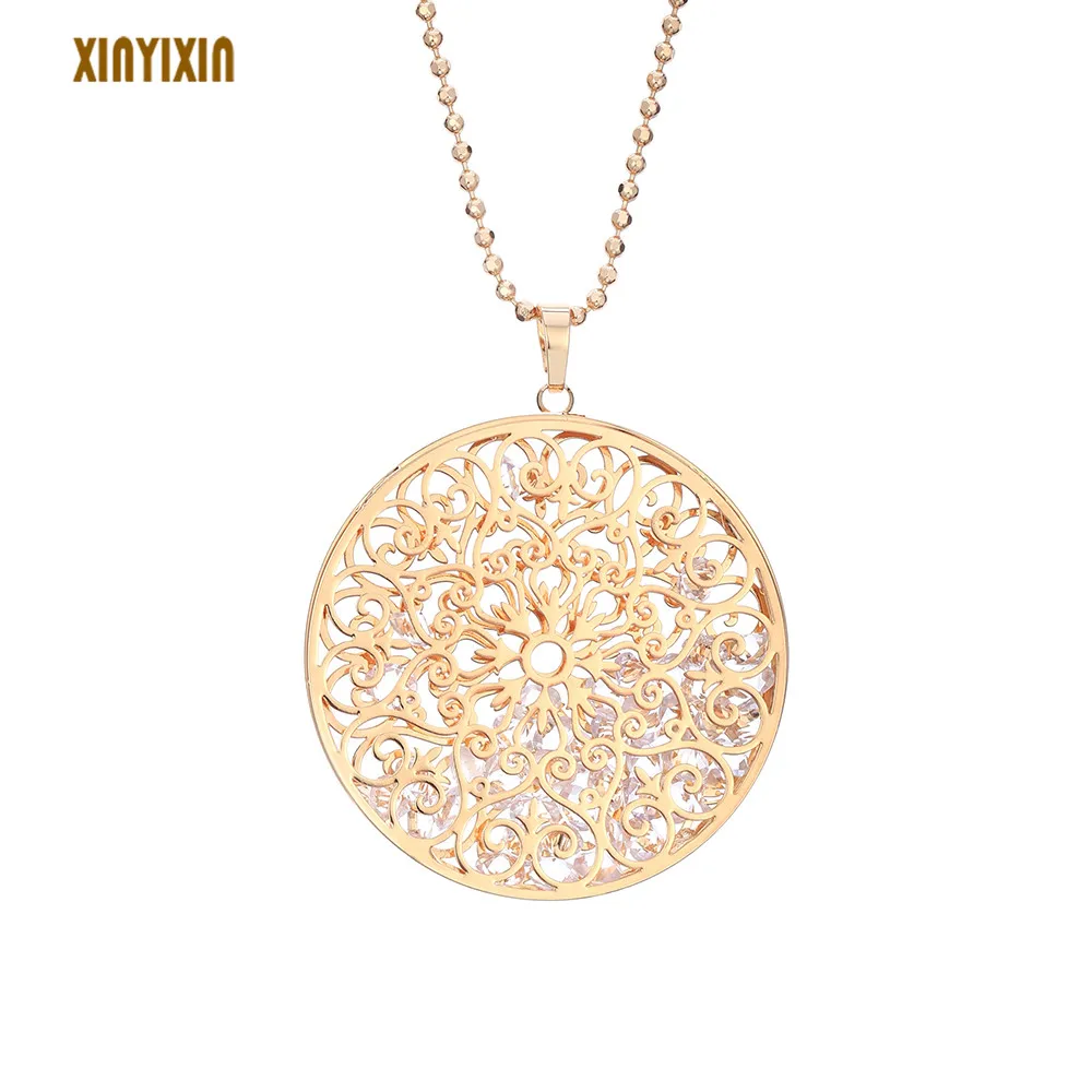 Round Flower Pattern Crystal Inside Pendant Necklace for Women Elegant Gold Hollow Long Necklace Sweater Accessory Party Gift
Round Flower Pattern Crystal Inside Pendant Necklace for Women Elegant Gold Hollow Long Necklace Sweater Accessory Party Gift