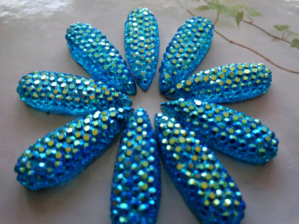 Dazzling blue AB colour stones sew on rhinestones flatback water drop shape 8*22mm resin crystal for dress 100pcs/lot
Dazzling blue AB colour stones sew on rhinestones flatback water drop shape 8*22mm resin crystal for dress 100pcs/lot