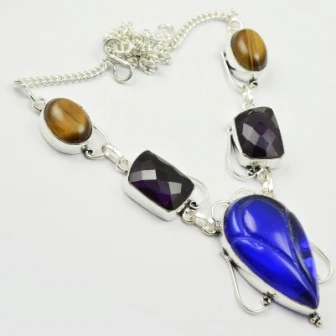 Carved-Iolites & Amethysts & Tiger Eye Necklace Silver Overlay over Copper, 49 cm, N2440
Carved-Iolites & Amethysts & Tiger Eye Necklace Silver Overlay over Copper, 49 cm, N2440