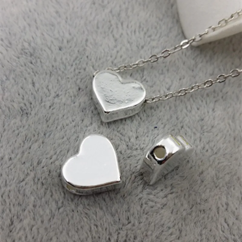 High Quality 20 Pieces/Lot 10mm*11mm Shiny Silver Plated Polished Smooth Heart Bead Charms Fit For DIY Jewelry Making
High Quality 20 Pieces/Lot 10mm*11mm Shiny Silver Plated Polished Smooth Heart Bead Charms Fit For DIY Jewelry Making