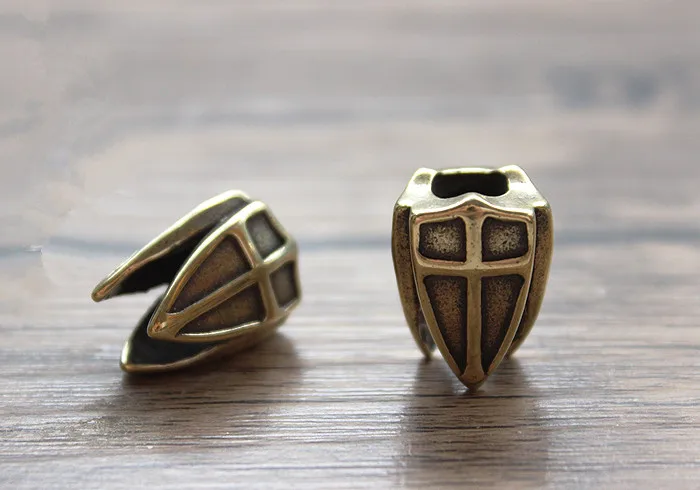 Brass Three-sided Shield Knife Beads Blade Hanging Buckle Phone Pendant EDC Multi Tools Umbrella Rope Pendant
Brass Three-sided Shield Knife Beads Blade Hanging Buckle Phone Pendant EDC Multi Tools Umbrella Rope Pendant