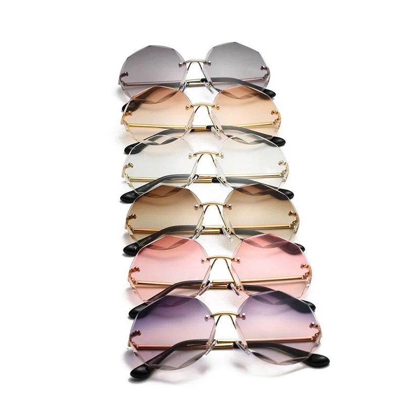 New Luxury Brand Designer Sexy Lady Rimless Round Sunglasses Women Diamond Cutting Lens Vintage Gradient Sun Glasses For Female
New Luxury Brand Designer Sexy Lady Rimless Round Sunglasses Women Diamond Cutting Lens Vintage Gradient Sun Glasses For Female