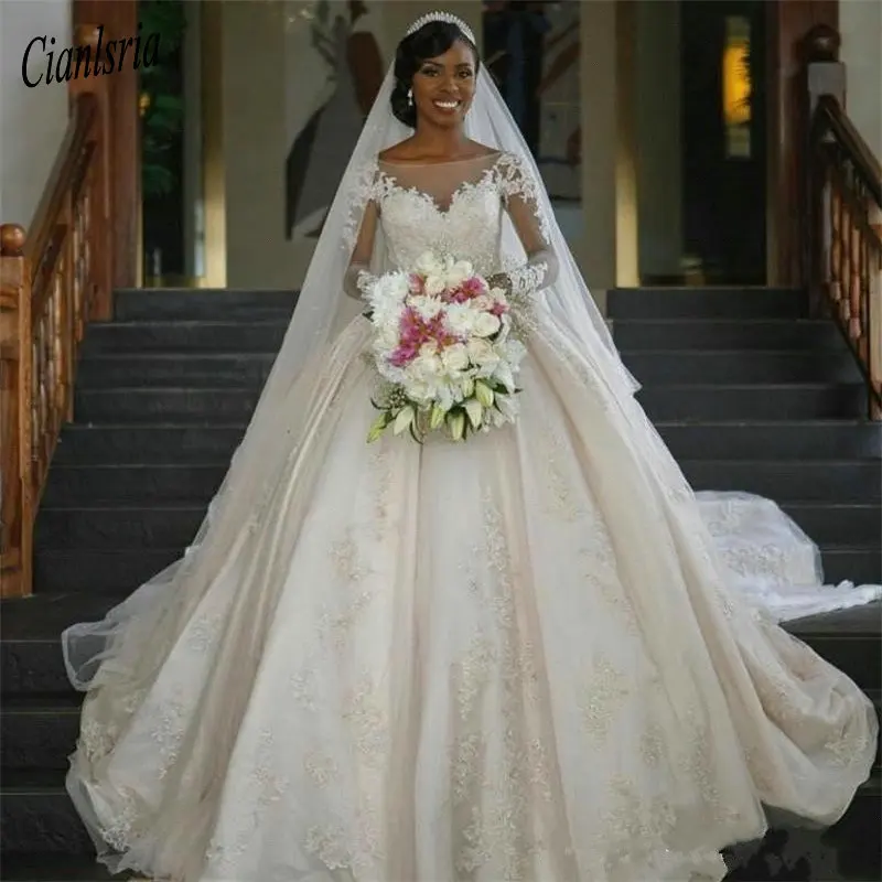 High Quality Satin Bridal Gowns with Long Train Illusion Back Sheer Neck Prepared For Cathedral Wedding Long Sleeves
High Quality Satin Bridal Gowns with Long Train Illusion Back Sheer Neck Prepared For Cathedral Wedding Long Sleeves