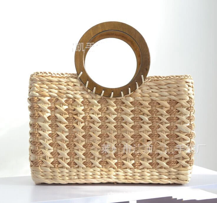 40X23CM Japanese brand straw bag lady handbags corn husk the original handbags circular wooden handle A2321
40X23CM Japanese brand straw bag lady handbags corn husk the original handbags circular wooden handle A2321